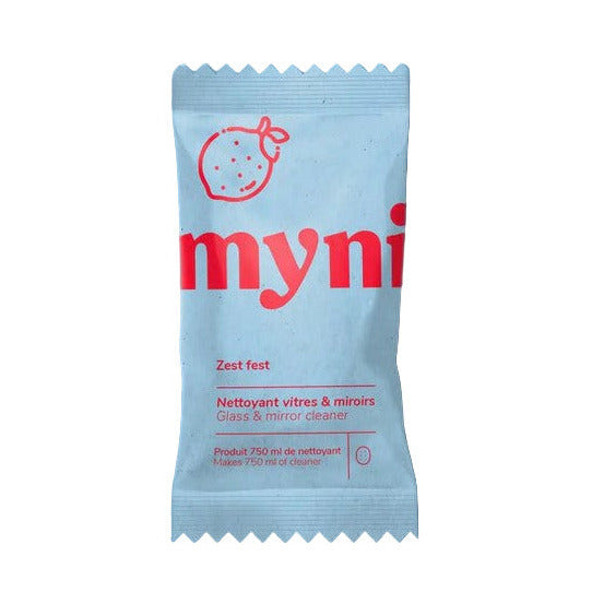 Light blue Myni Zest Fest Glass and Mirror Cleaner Tablet in compostable packaging with citrus design — eco-friendly Canadian zero-waste glass cleaner