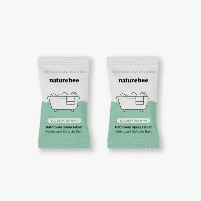 Close-up of Nature Bee bathroom spray tablets packaging showing the textured label and eco-friendly design details.