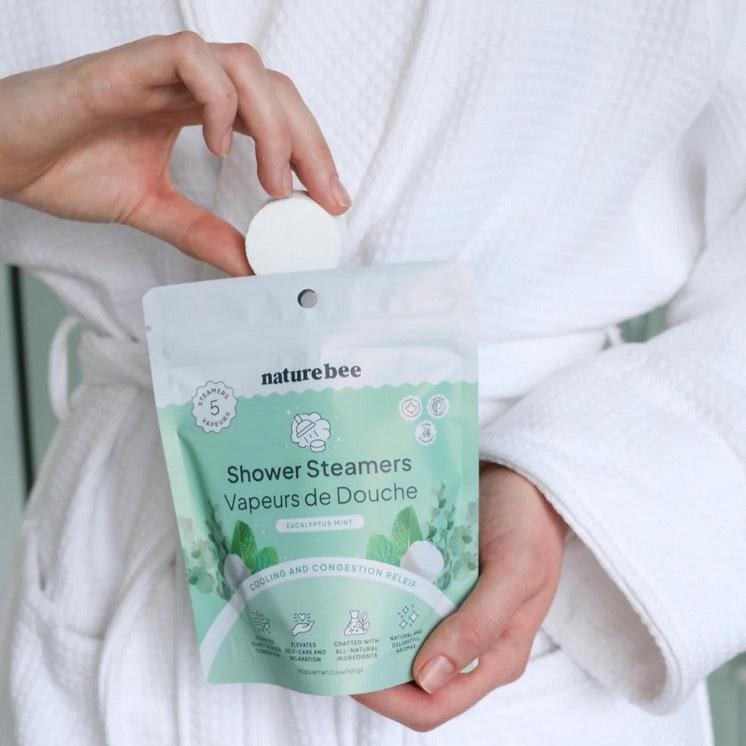 Nature Bee Shower Steamers with organic herbal ingredients, light green and white molded discs for aromatherapy enjoyment