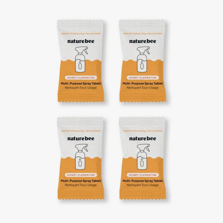 Close-up of the biodegradable tablet packaging with fresh clementine illustration and clear dosage instructions visible