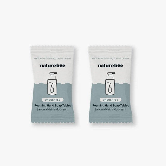 Close-up of the biodegradable foil wrapper and natural brown tablet texture, highlighting eco-friendly packaging details.