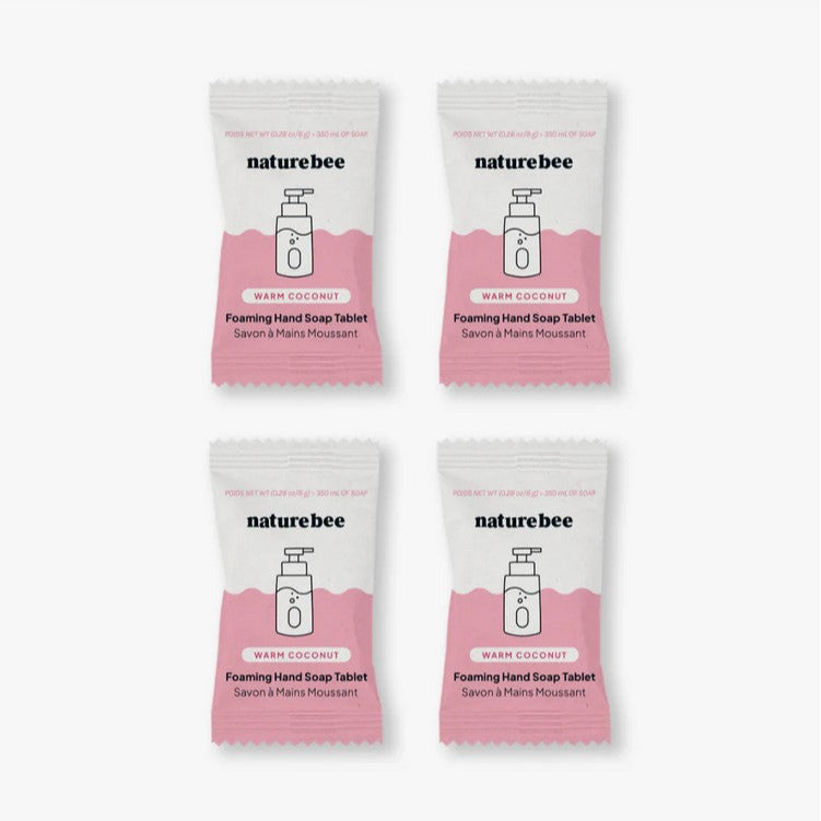 Close-up of the foil wrapper displaying the "Nature Bee" logo and coconut scent details on the soap tablet label