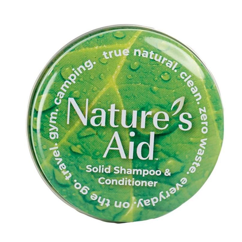 Close-up of the smooth, recycled aluminum travel tin with clear "Nature's Aid" logo and textured lid surface.