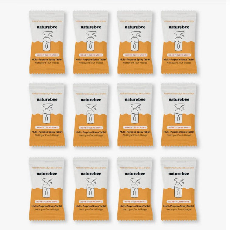 Close-up of the crumbled, textured honey tablet with visible citrus scent beads and detailed surface finish.