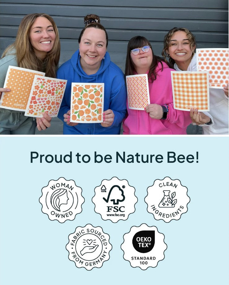 Close-up of the textured surface and vibrant orange hue of the Nature Bee Sponge Cloth, showcasing its absorbent