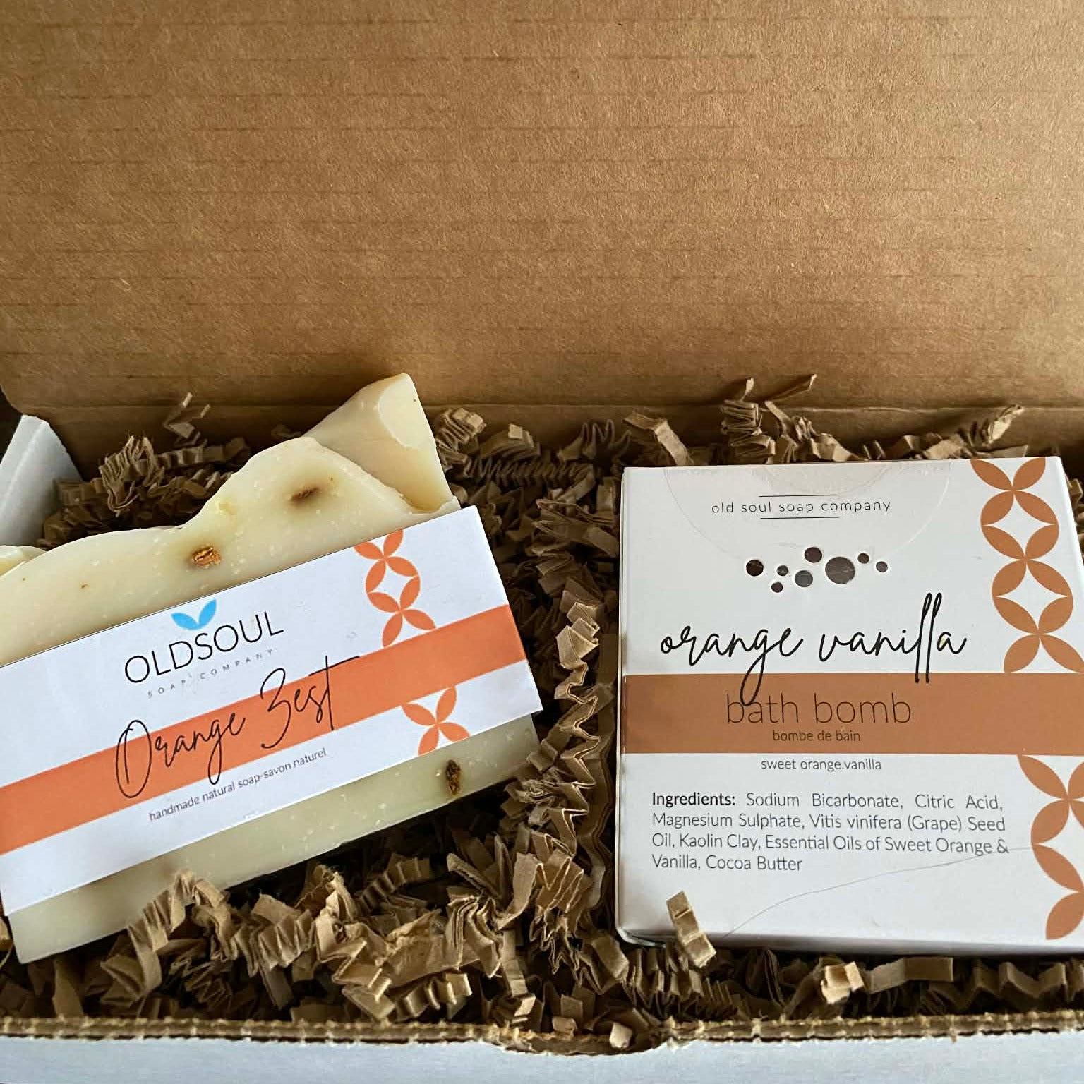 Orange Vanilla Gift Set featuring Old Soul Soap Company Orange Zest vegan soap and Orange Vanilla bath bomb in eco-friendly gift box with kraft paper packaging.