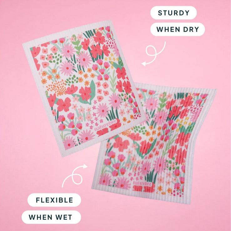 Close-up of Pink Nature Bee Sponge Cloth's textured surface emphasizing the intricate bee pattern and vibrant pink hue