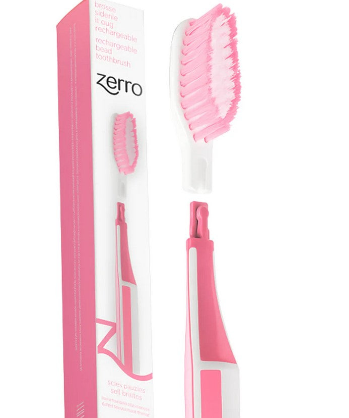 Zerro Replaceable Head Pink Toothbrush with textured silicone grip and white replaceable head, designed for eco-friendly