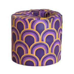 Close-up of colorful wrap design on bamboo toilet paper roll showing vibrant print and smooth texture.