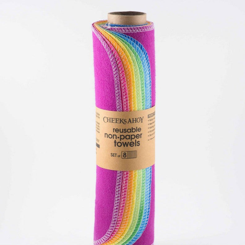 Close-up of rainbow-striped reusable non-paper towel edges showcasing vibrant color bands and woven texture detail.