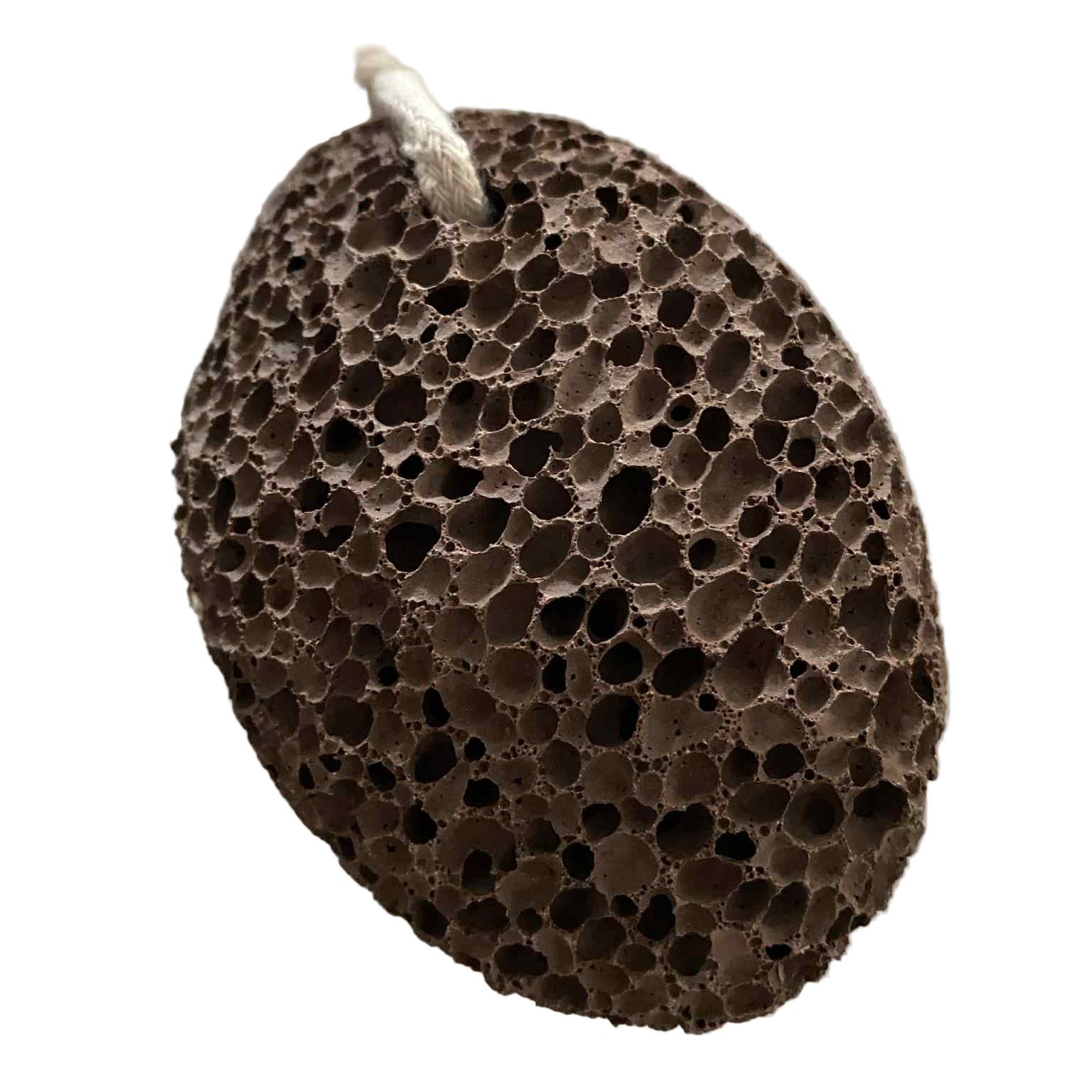 Close-up of the natural volcanic lava pumice stone's porous surface highlighting tiny air pockets and textured detail from