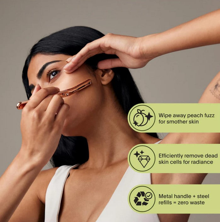 Close-up of the Rose Gold Leaf Face and Body Set Kit’s textured metallic razor handle with engraved floral detailing.