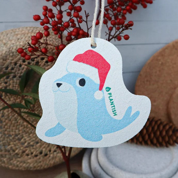 Close-up of the colorful sponge faces highlighting their textured, scrubby surface ideal for festive cleaning tasks