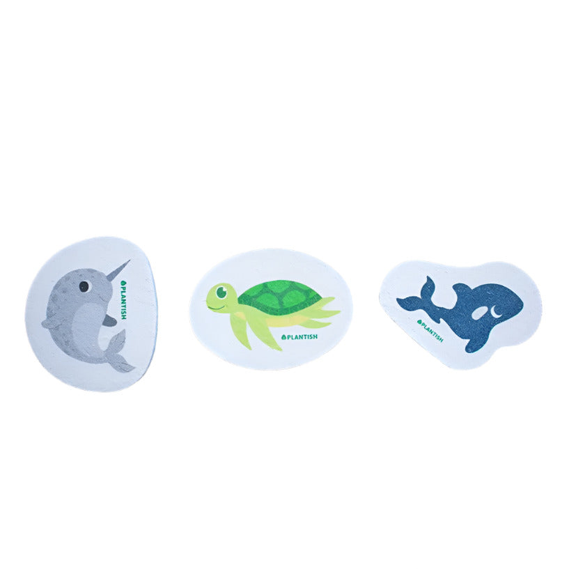 Plantish Sea Soaked Pop Up Sponges featuring colorful sea turtle, unicorn dolphin, and orca designs made from cellulose