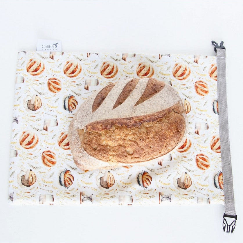 Reusable sourdough bread storage bag with waterproof liner and roll top closure