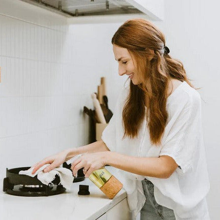 Close-up of the Revolubar Grease and Grime Spray Cleaner Tablet packaging showing detailed label and embossed logo on the