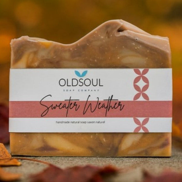 Close-up of the Winter Soap Gift Box label showing festive snowflake design and product scent details on textured paper