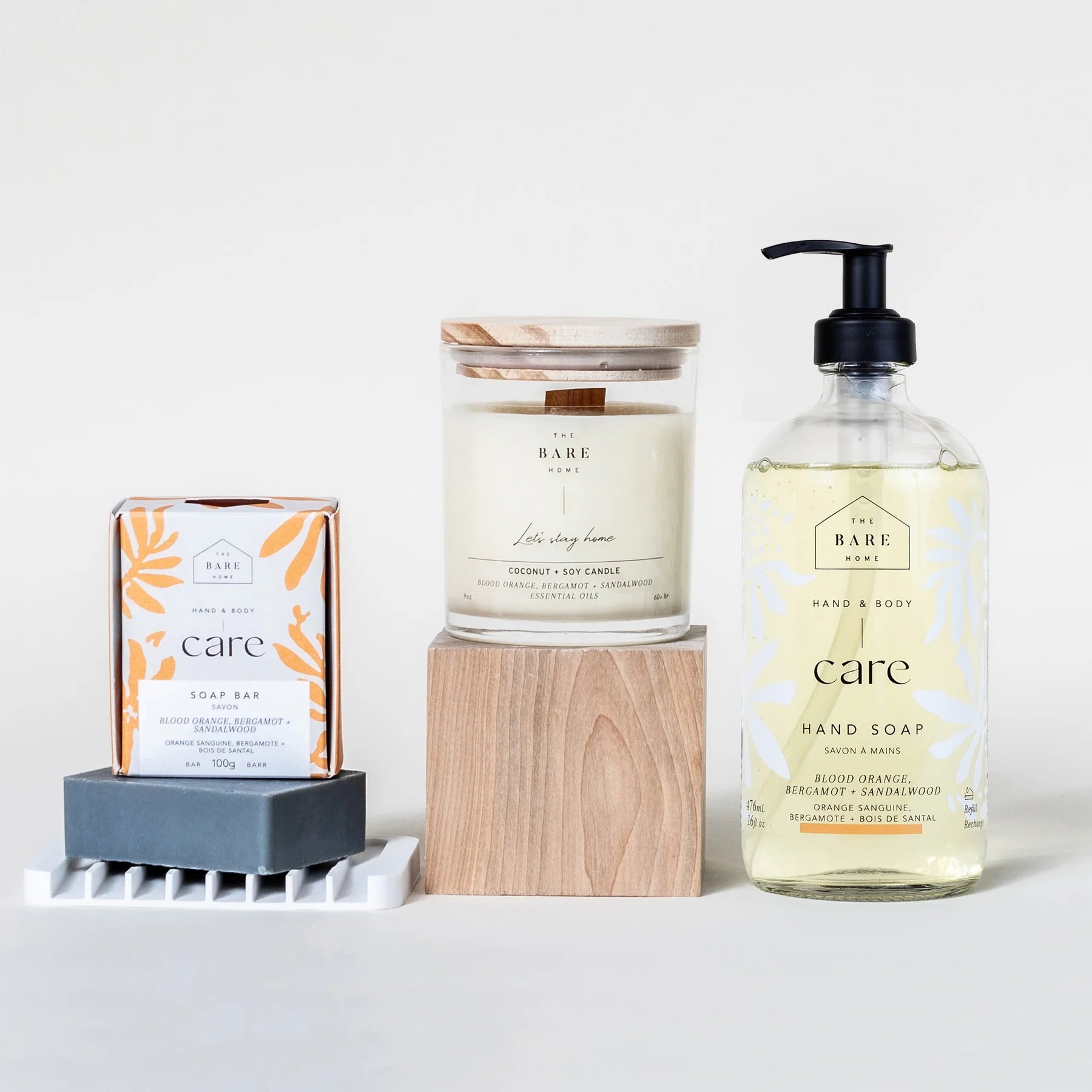 The Bare Home Care Kit featuring blood orange, bergamot, and sandalwood soap and candle set in eco-friendly packaging