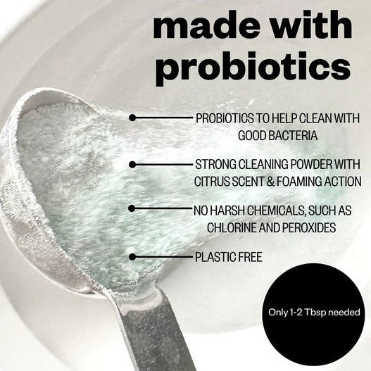 Close-up of probiotic toilet bowl cleaner gel with visible green algae-like texture and clear measuring mark on transparent