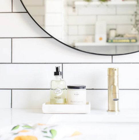 Close-up of the White Pottery Soap Tray’s smooth, rounded edges and subtle glaze crackle finish from an overhead angle