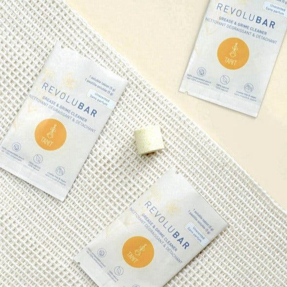 Image of Revolubar Grease and Grime Spray Cleaner Tablet packaging showing textured surface and vibrant label design from a