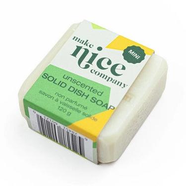 Close-up of the unscented solid dish soap bar’s textured surface and rounded edges on a white background.