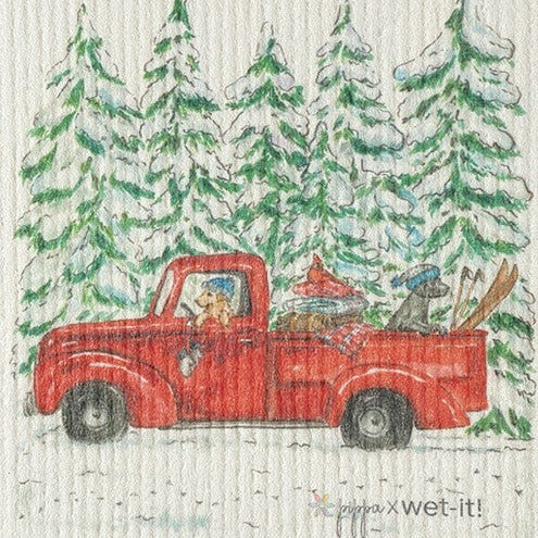 Vintage Christmas Swedish dishcloth featuring a red truck and festive winter design by Wet It! Cloths