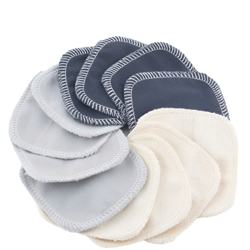 Close-up of the textured, terrycloth surface of the charcoal reusable facial rounds showing soft, plush fabric fibers.