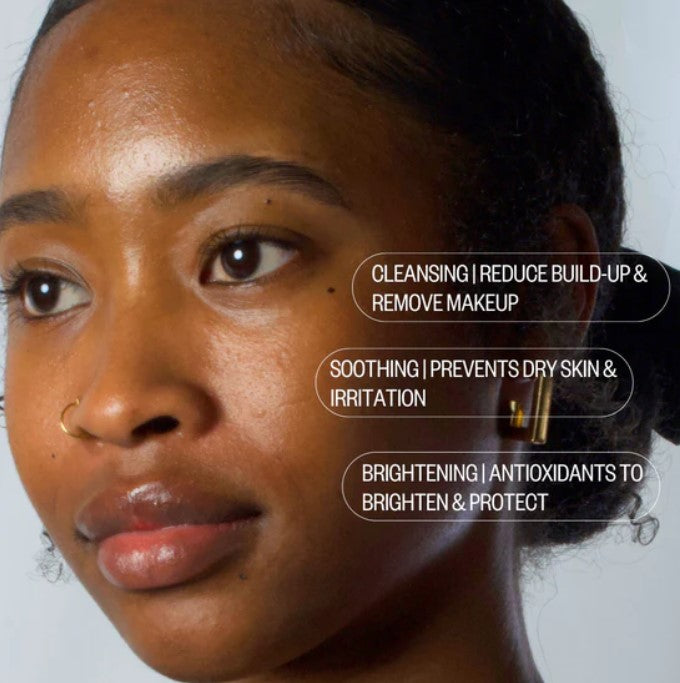 Close-up of the Facial Cleanser Concentrate tube’s sleek textured surface and fresh mint scent label detail.