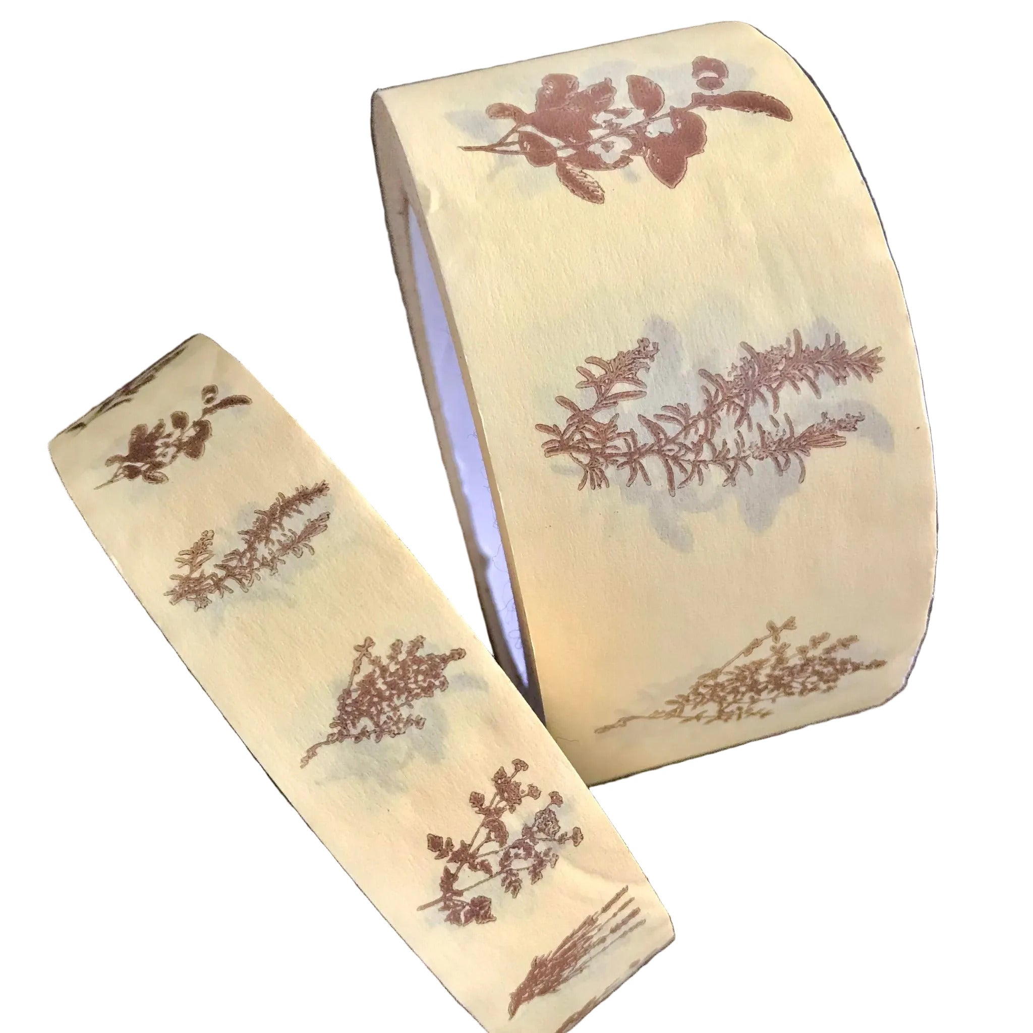 Close-up of the eco-friendly paper tapes with herb motif on a white background