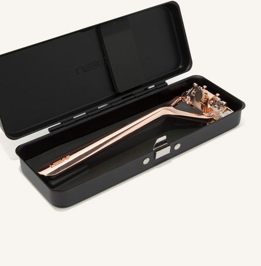 Close-up of the Leaf Travel Case’s textured metal surface with subtle engraving detail and sleek magnetic clasp in a