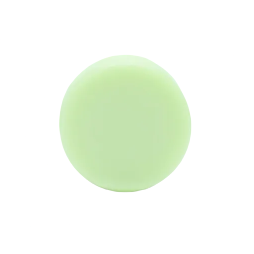 Close-up of the Good Juju Conditioner Bar's textured surface with subtle scent notes visible, highlighting its nourishing