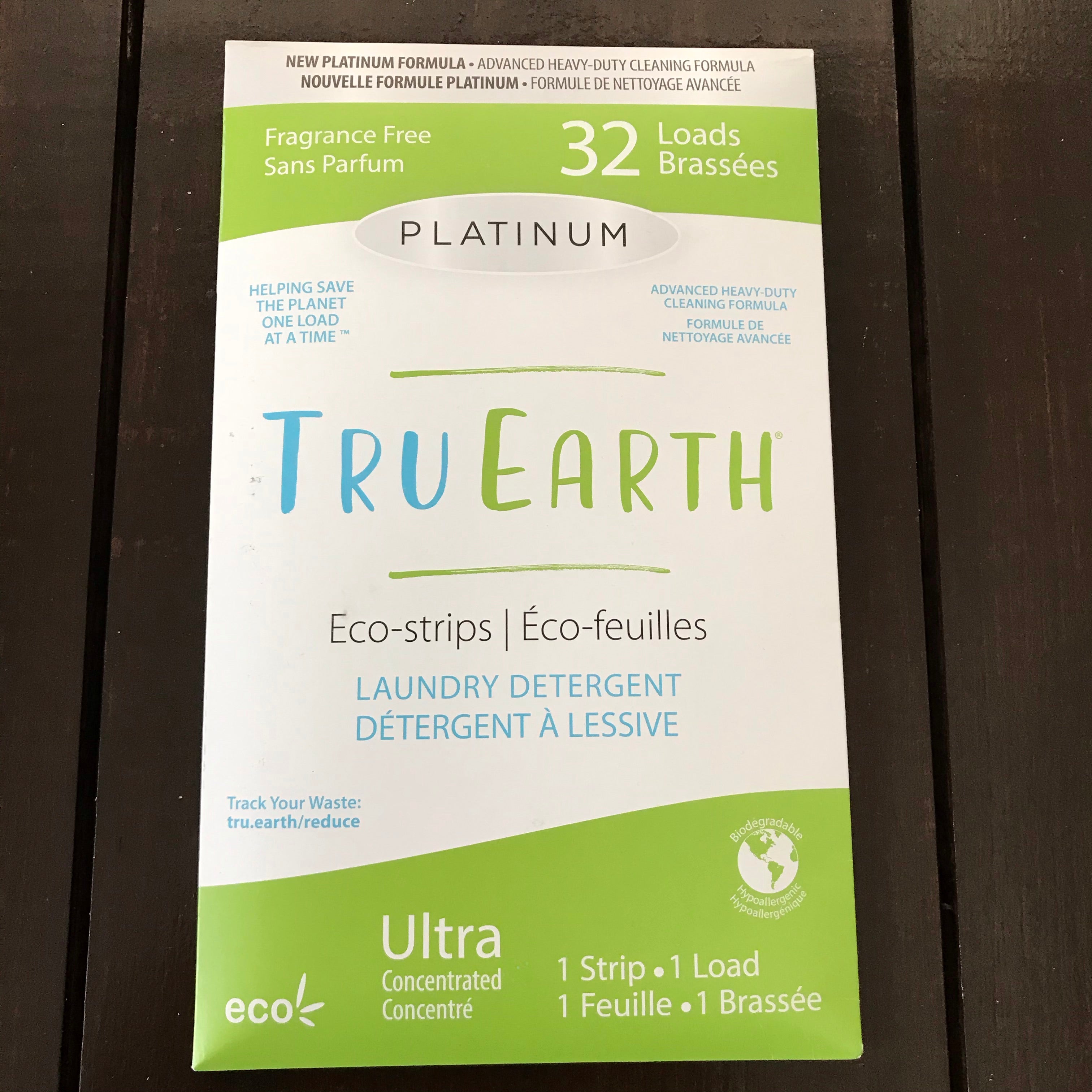 Close-up of Tru Earth Eco Strips laundry detergent box showcasing eco-friendly branding and compact packaging design