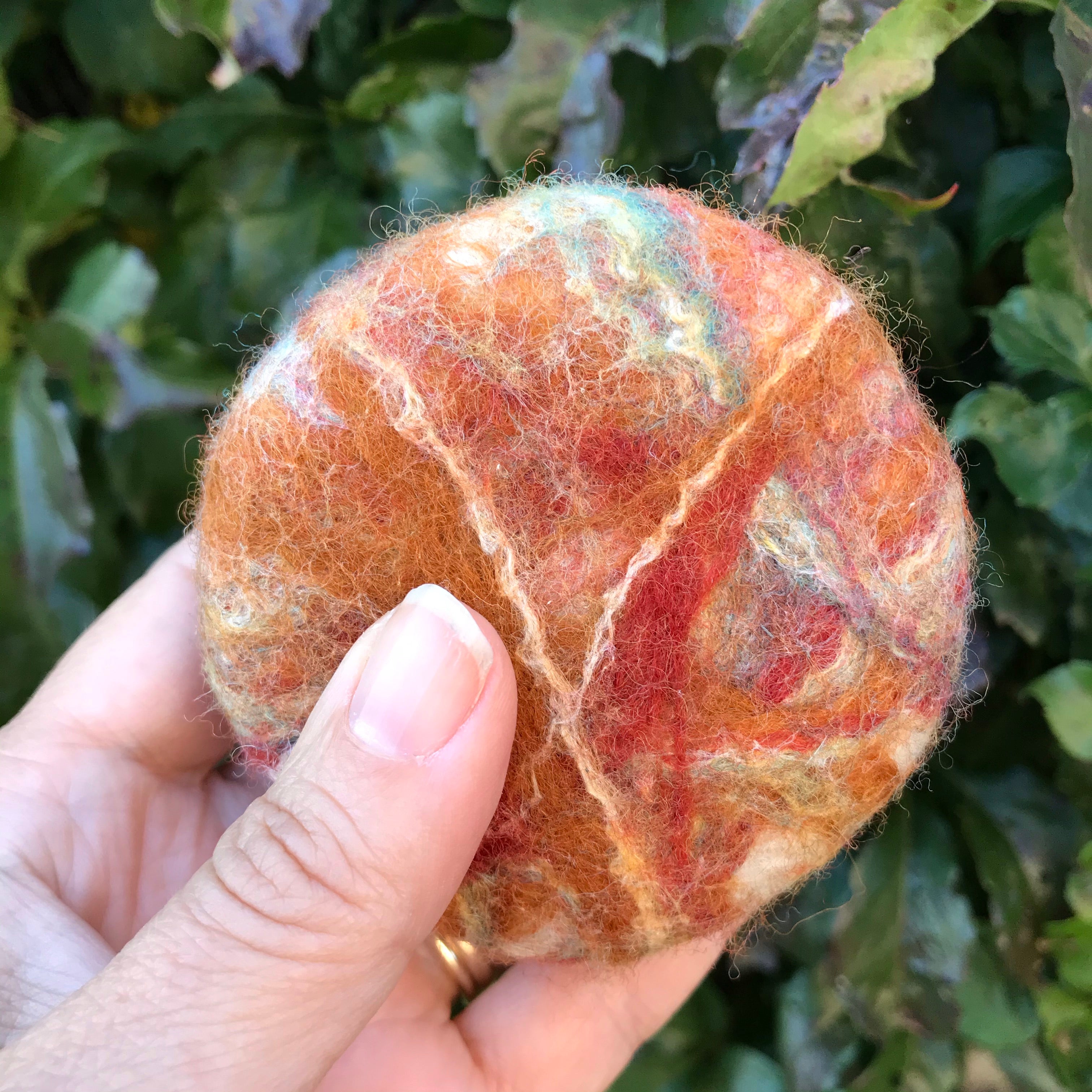 Felted apple cinnamon soap bar by Simply Natural Canada with textured wool felted exterior, autumn-inspired artisan felted