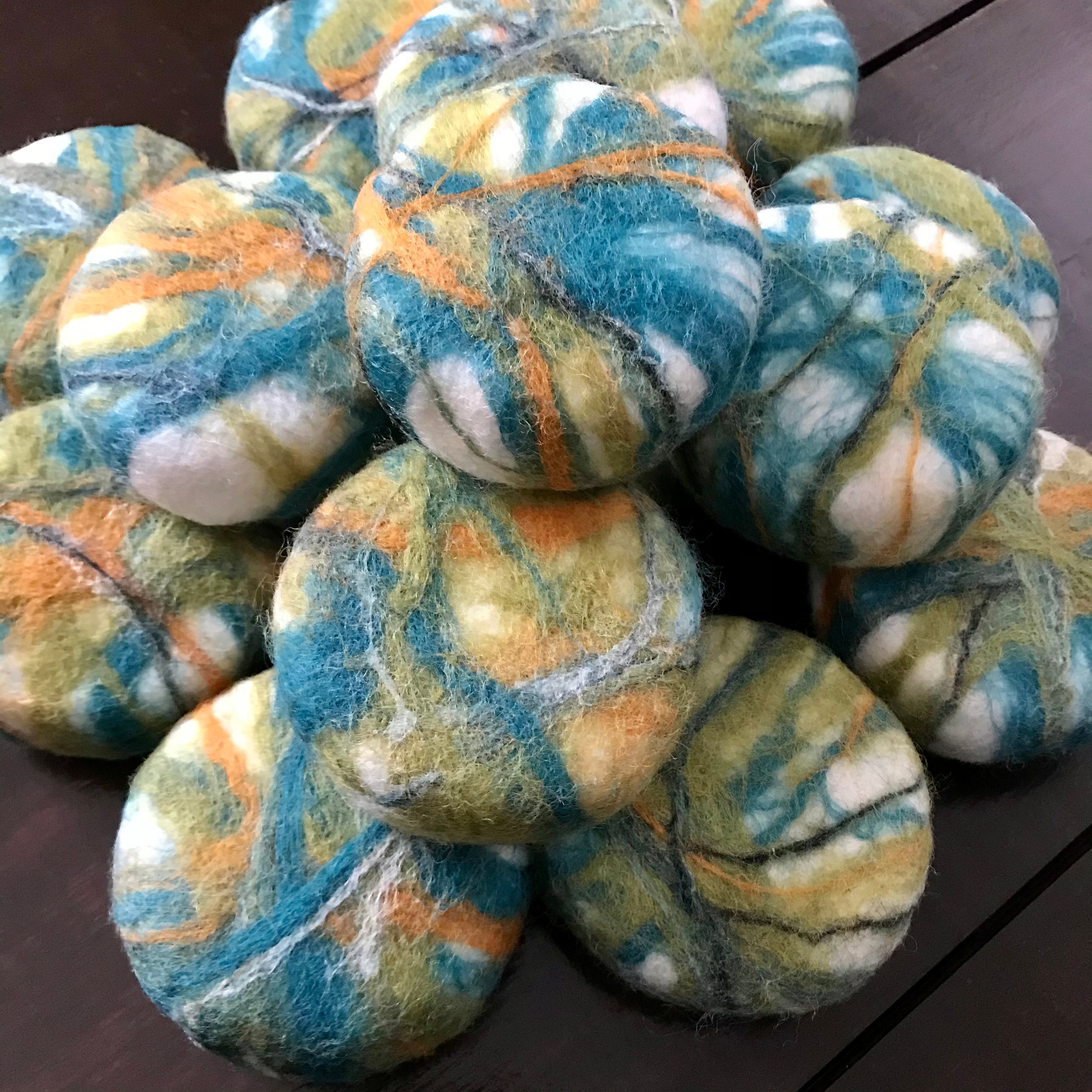 Close-up of felted cedar sage soap’s textured surface highlighting natural fibers and earthy green, showcasing artisanal