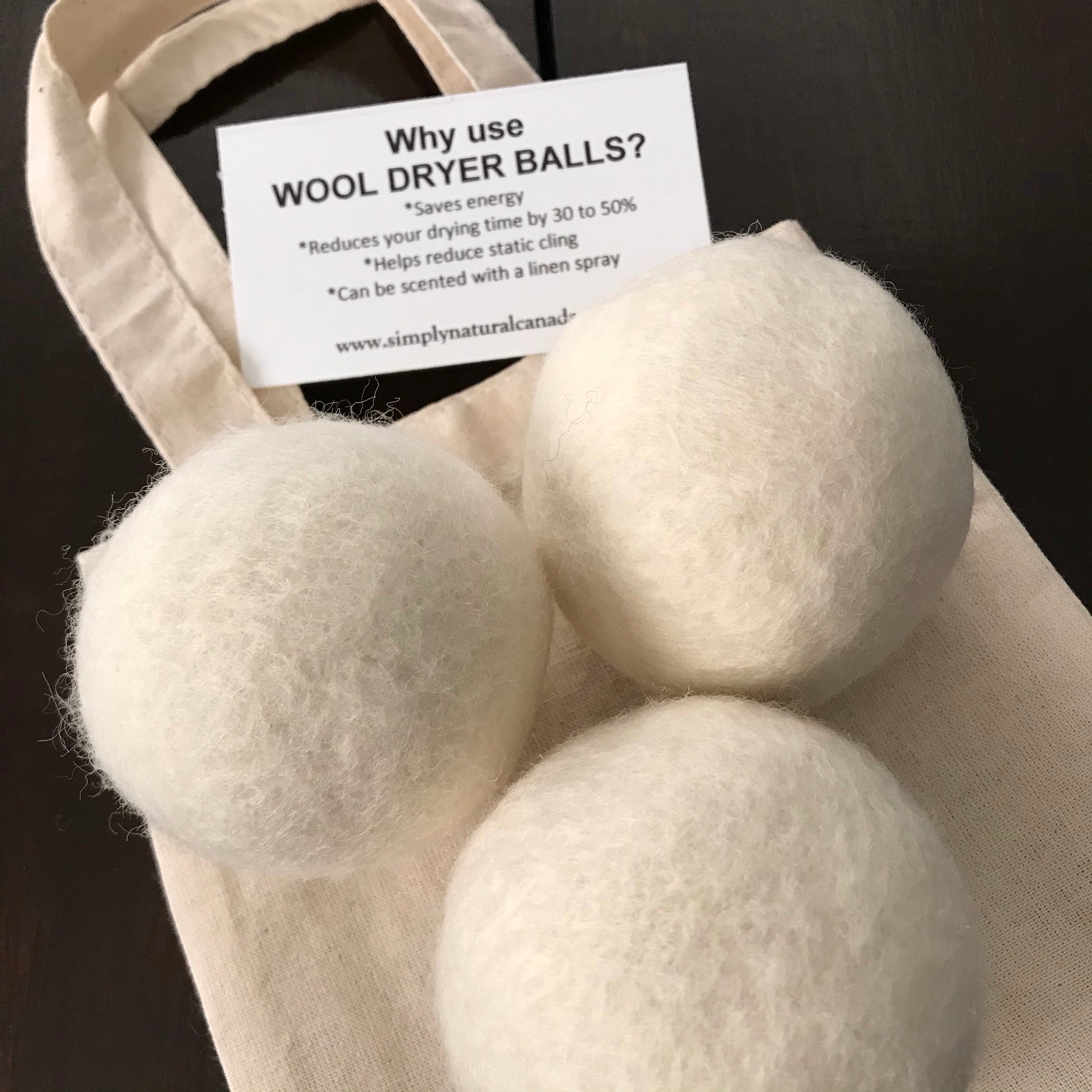 Simply Natural Canada wool dryer balls set with six 100% felted grey wool balls, 3 inches diameter, textured surface for