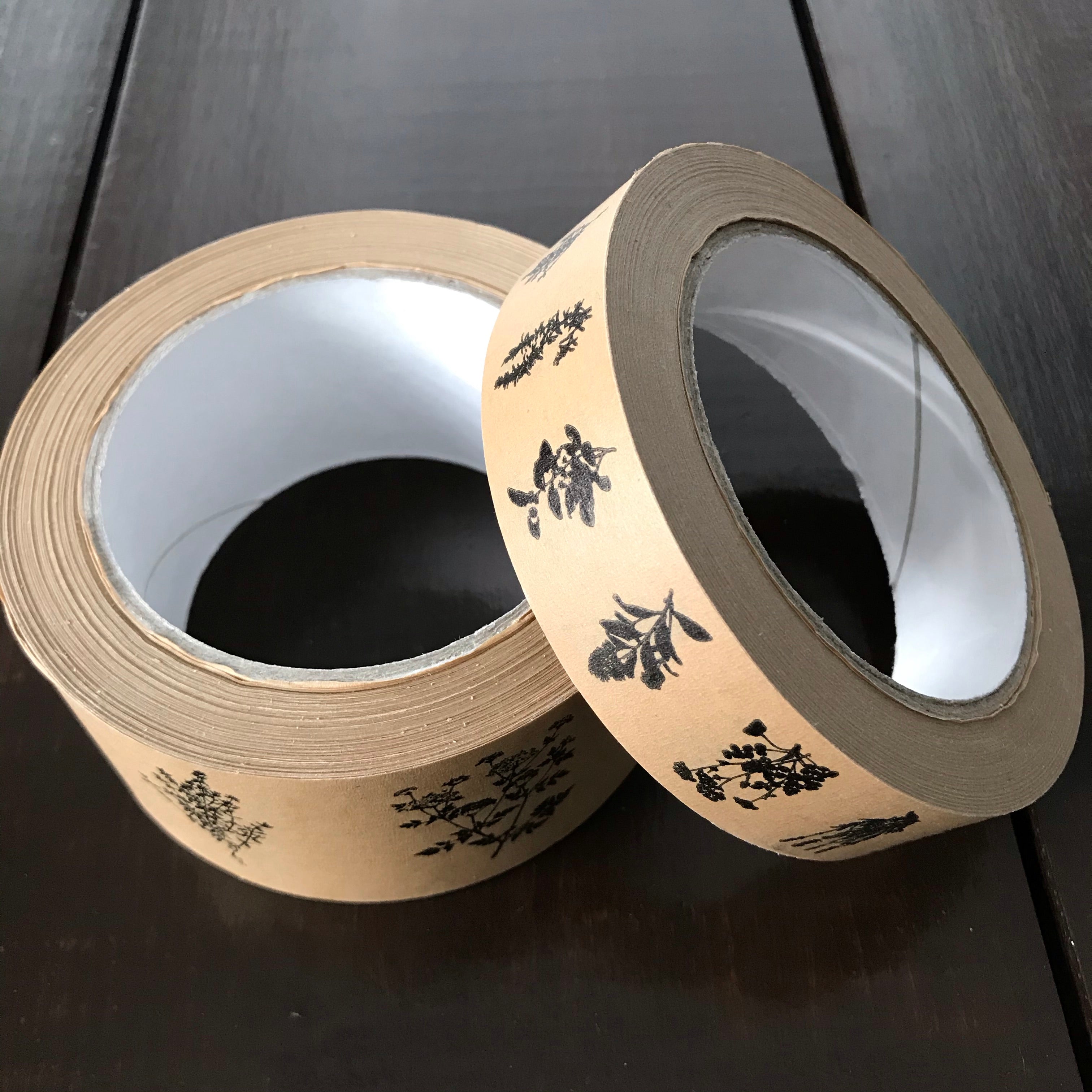 Close-up of eco-friendly paper tape's textured surface featuring natural kraft finish and subtle fiber details under soft