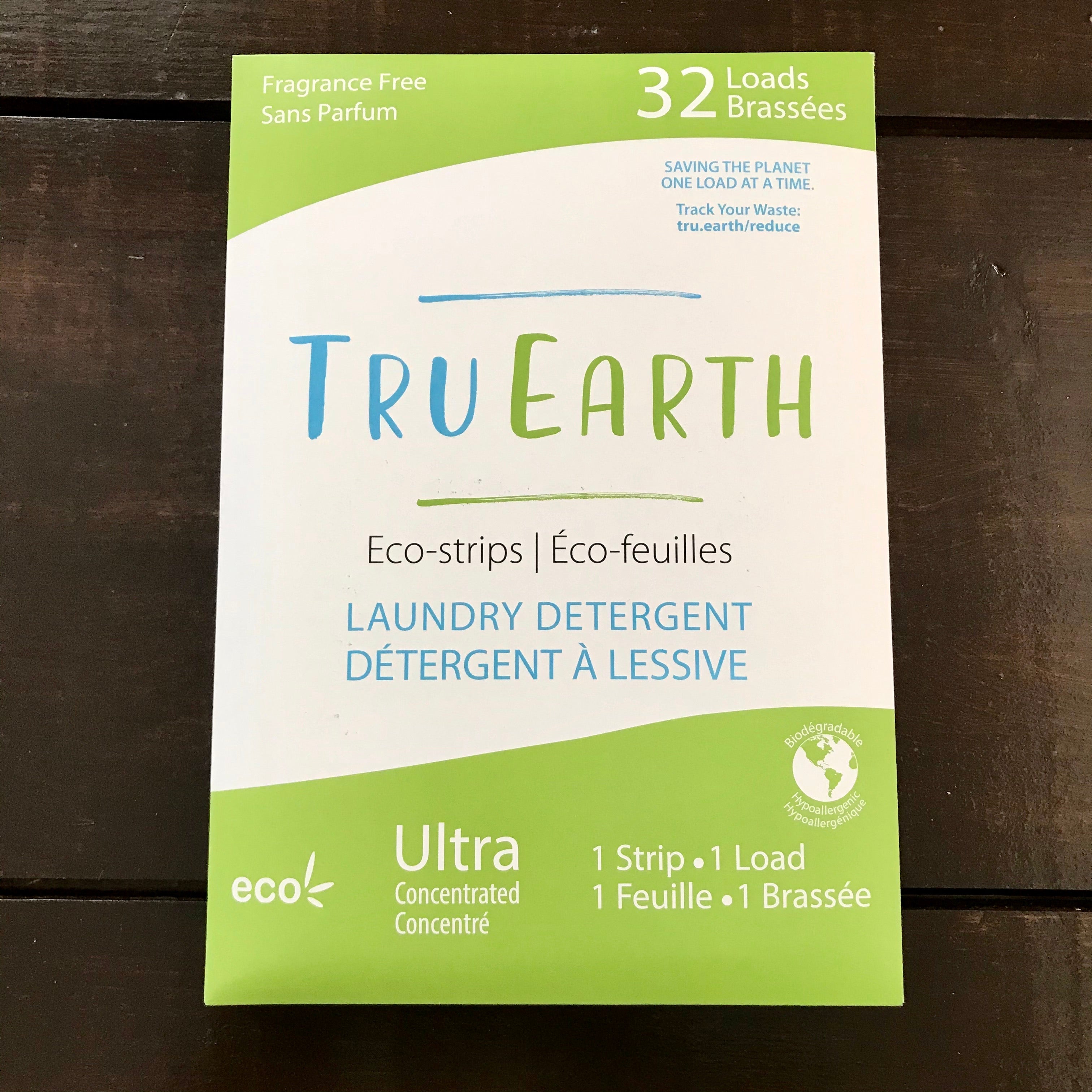 Close-up of Tru Earth Eco Strips laundry detergent package emphasizing the vibrant label and eco-friendly branding design.