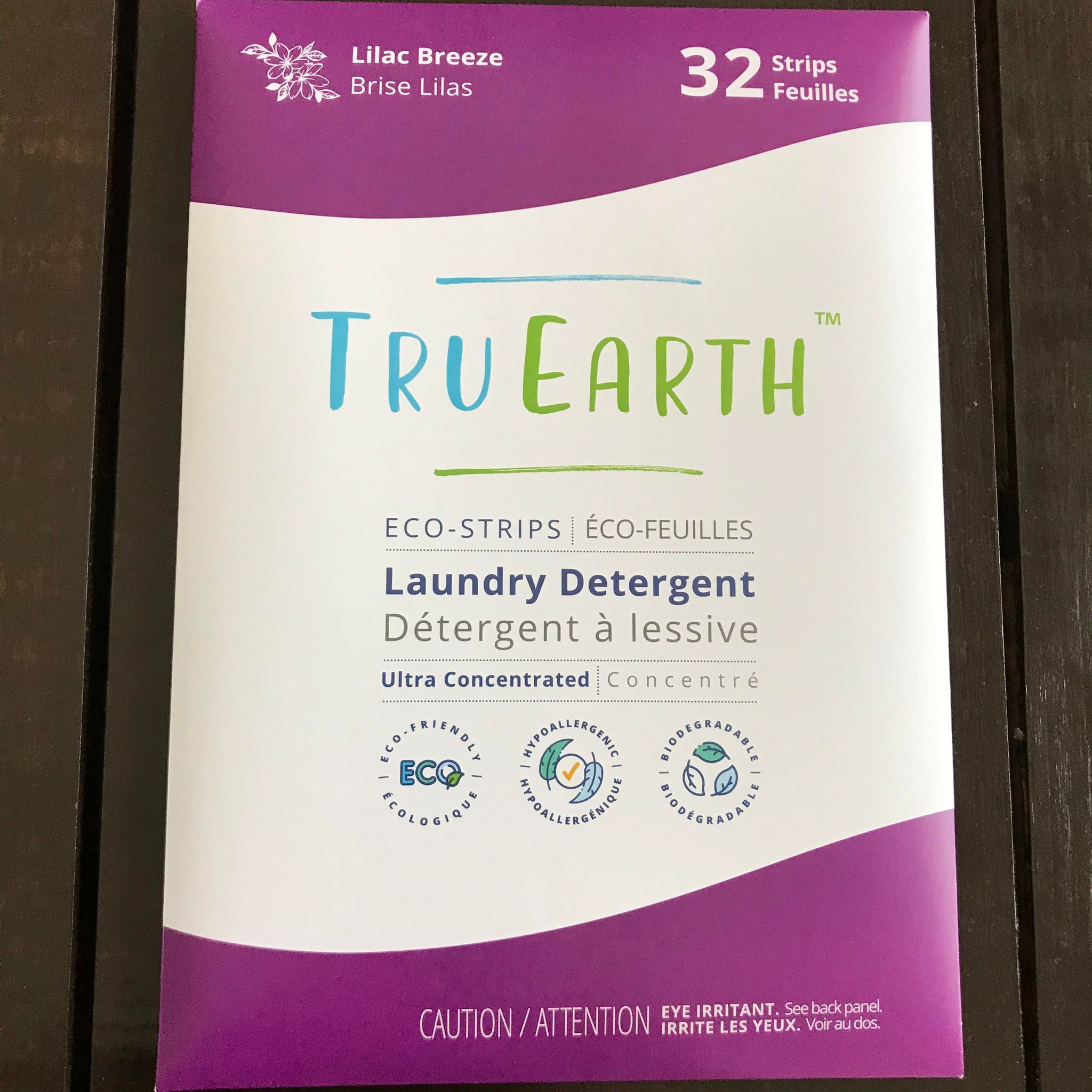 Close-up of Tru Earth laundry strips showing textured surface and precise fold lines for easy use