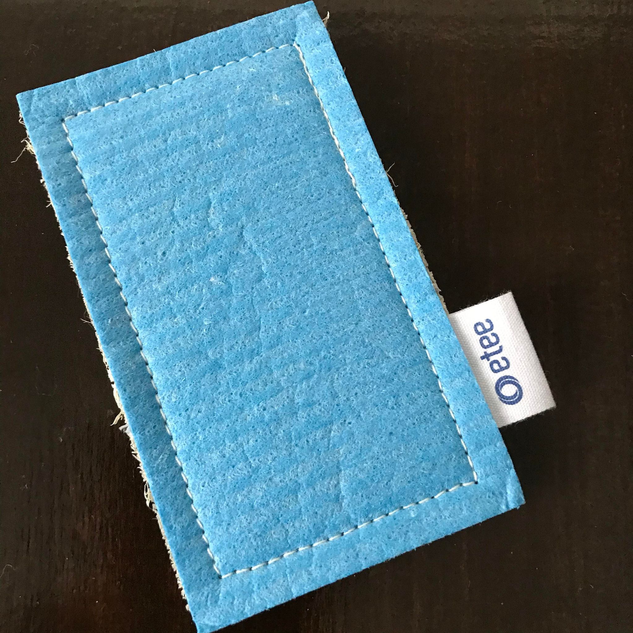 Close-up of the Loofie Scrubber's textured silicone bristles in vibrant green, showcasing durability and flexible cleaning