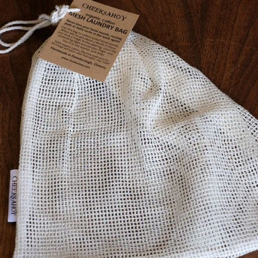 Cheeks Ahoy large cotton mesh laundry bag with reinforced handles and drawstring closure, made in Canada, white color