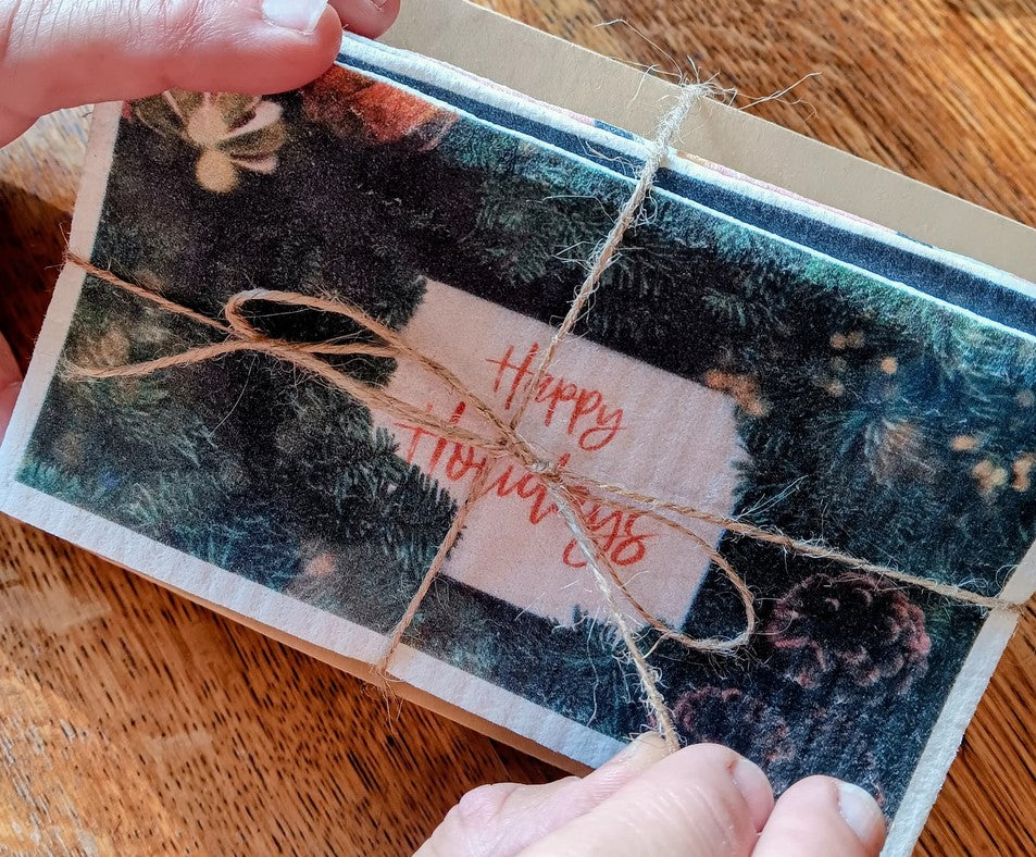 Swedish Dishcloth Holiday Cards design featuring festive red and green print, Earthly Change brand, made from absorbent