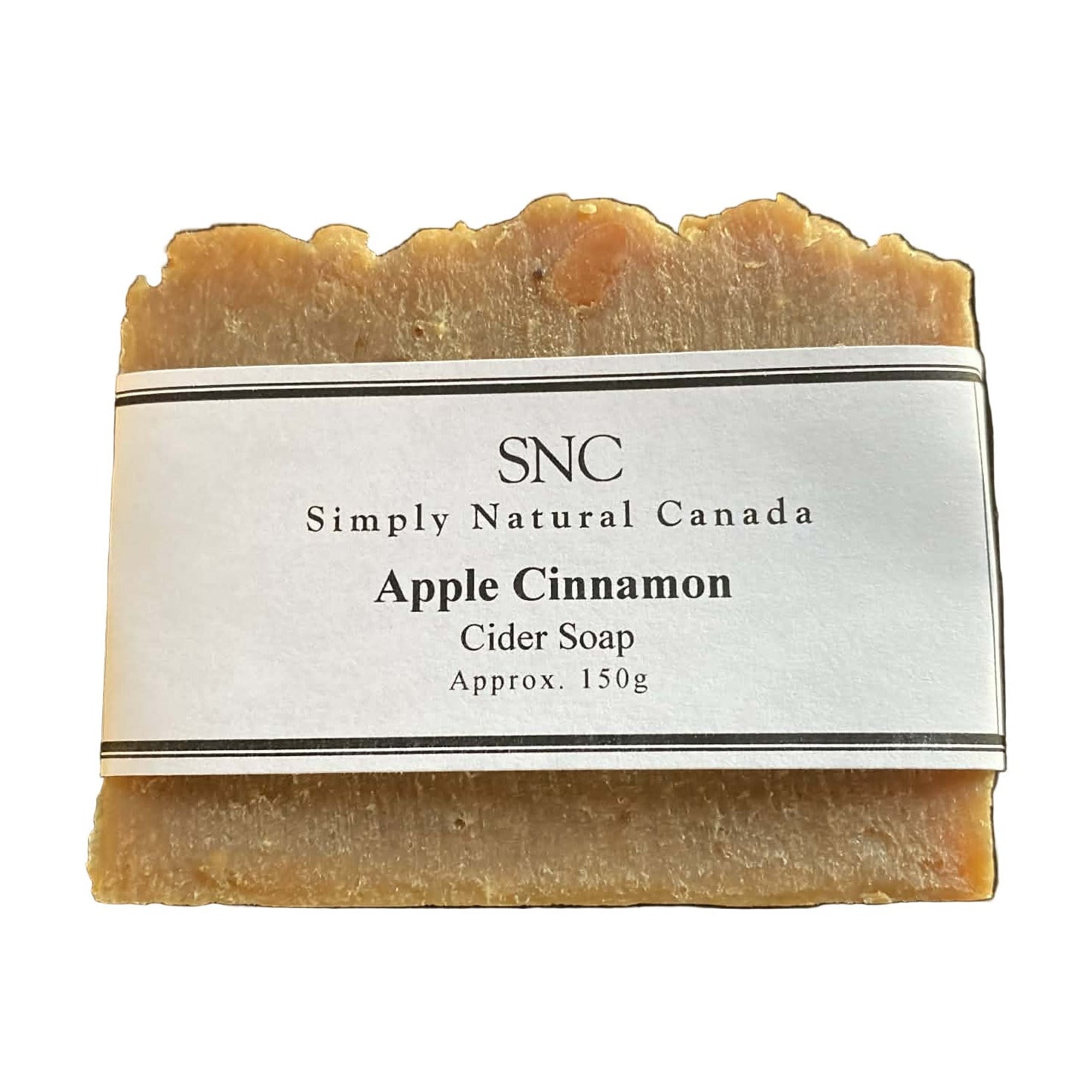 Apple Cinnamon Cider Soap rectangle bar by Simply Natural Canada, handcrafted vegan cider soap with rustic texture and white label stating SNC Apple Cinnamon Cider Soap approx. 150g.