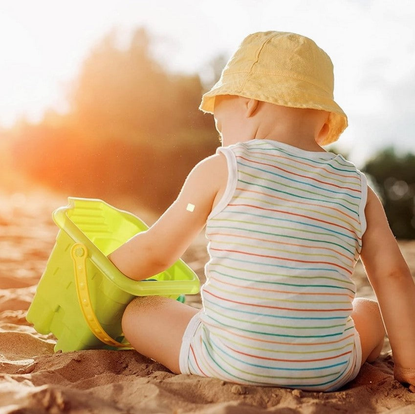 Close-up of NATPAT UV Sensing Sticker showing textured surface and bold black and yellow color details on the packaging foil.