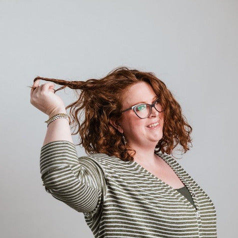 Close-up of the shampoo bar’s textured surface highlighting natural ingredients and refreshing citrus scent on a clean