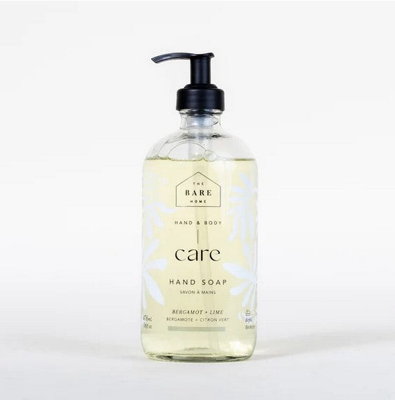 Close-up of the Bergamot Lime Hand Soap label highlighting the vibrant citrus graphic and crisp white pump dispenser.