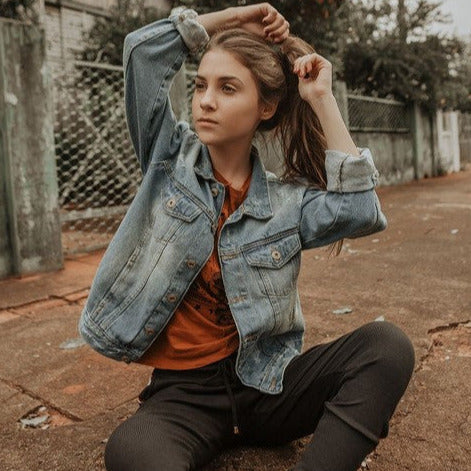 Close-up of biodegradable hair ties twisted together, showcasing their smooth texture and natural elastic material in