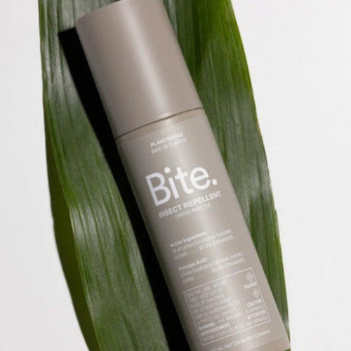 Bite Insect Repellent tube with white plastic cap and green label displaying Bite logo and insect graphics