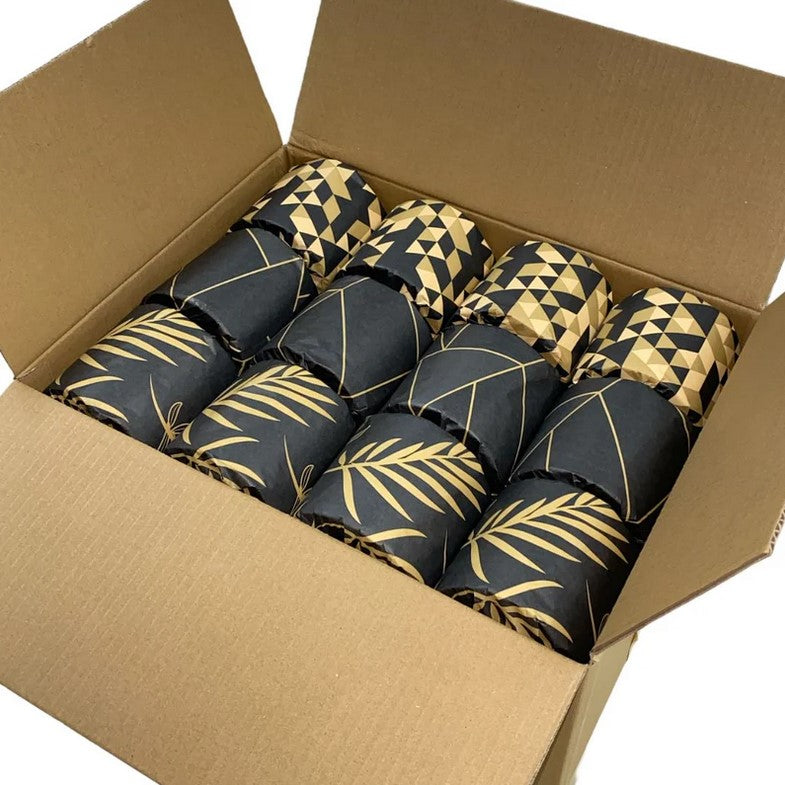 Close-up of the black and gold embossed bamboo texture on the Roll Up Bamboo Toilet Paper packaging, highlighting intricate
