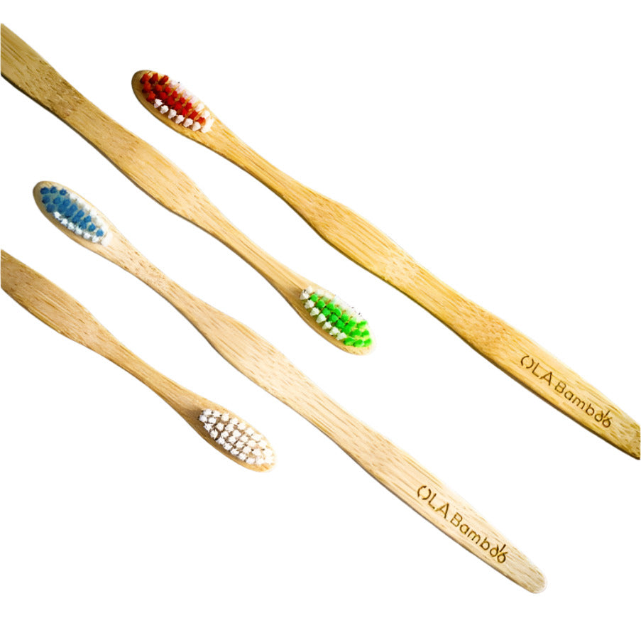 OLABamboo set of 4 Canadian-made bamboo toothbrushes with soft nylon bristles, green handles, textured grip, and natural